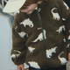 Konges Slojd детско яке от полар Joddy Teddy GRS Dino Silhouette